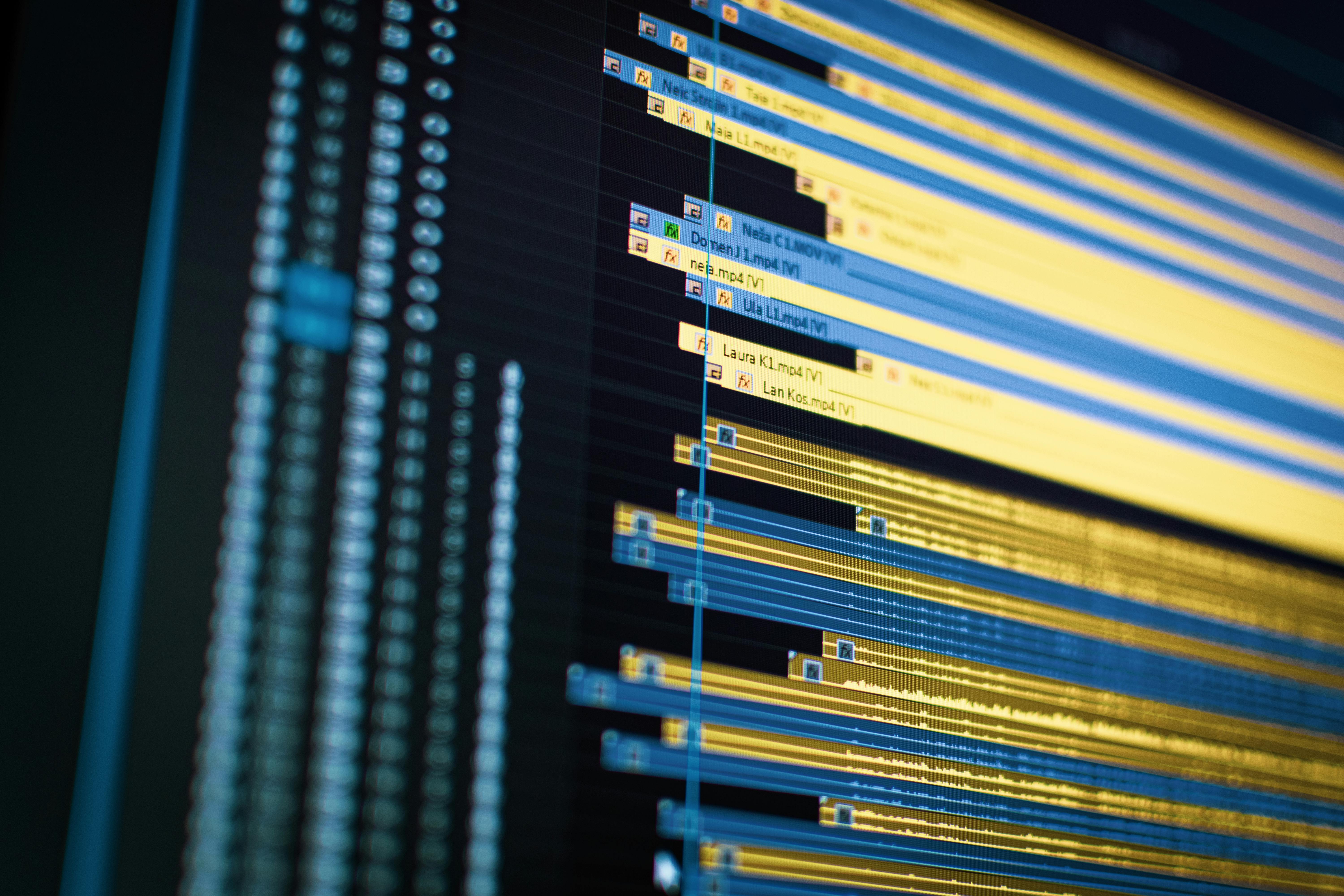 Close-up of a video editing timeline on a computer screen, showcasing modern technology.